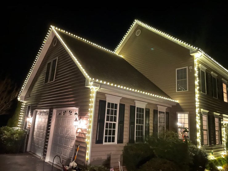 Side view of warm white roofline lighting